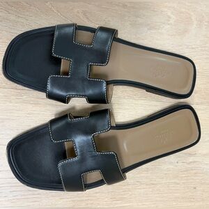 Hermes Black Leather H Oran Slide Sandals with Tan Footbed